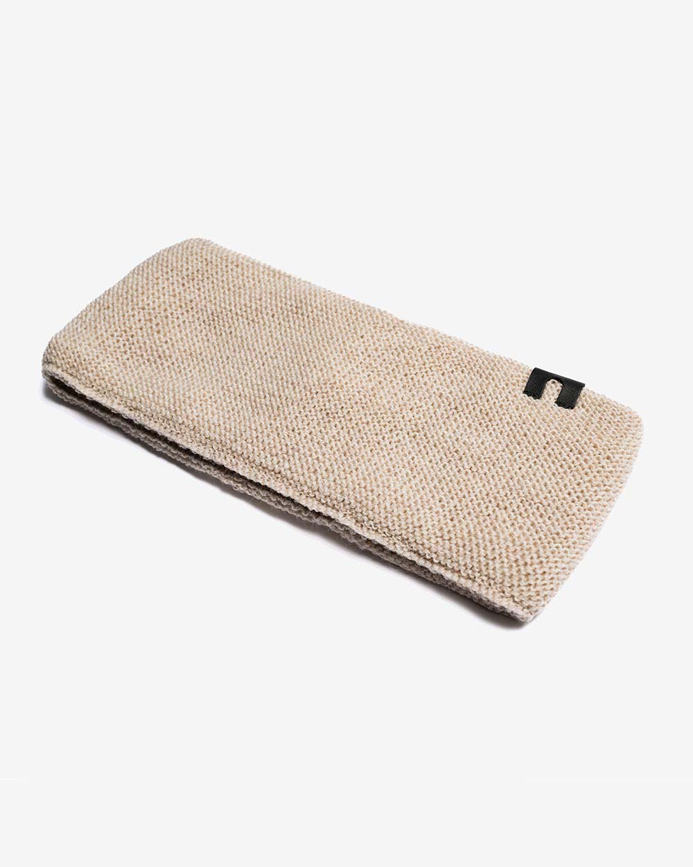 Seitenansicht des Merino Stirnbands in Beige
